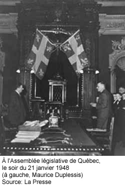 Maurice Duplessis à l'Assemblée législative, le jour de l'adoption du fleurdelisé comme drapeau officiel du Québec
